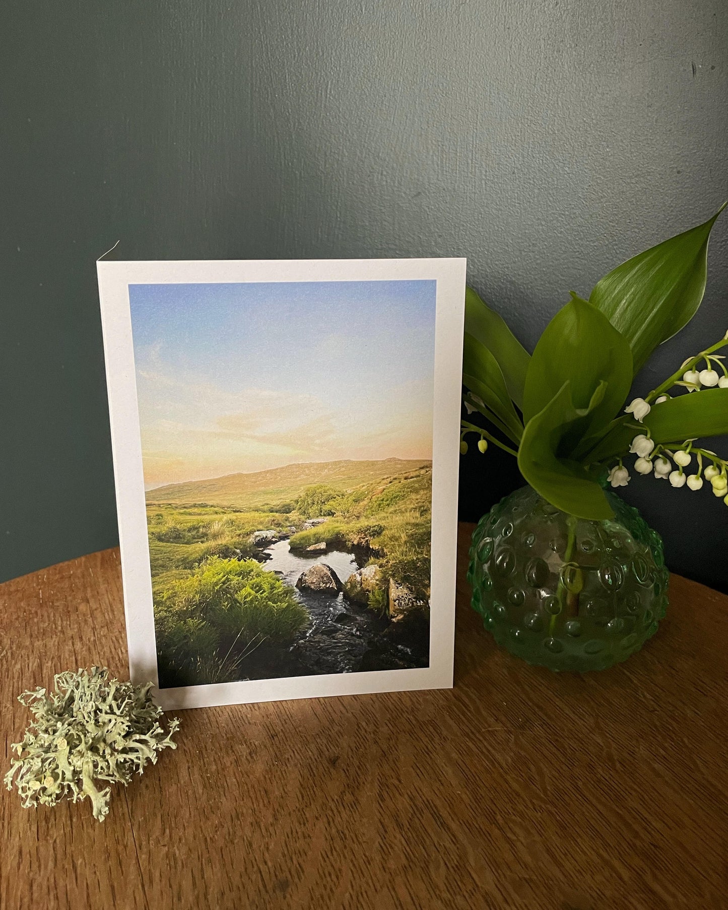 Dartmoor themed greeting card showing the Black a ven brook tumbling through moorland under a sunset sky
