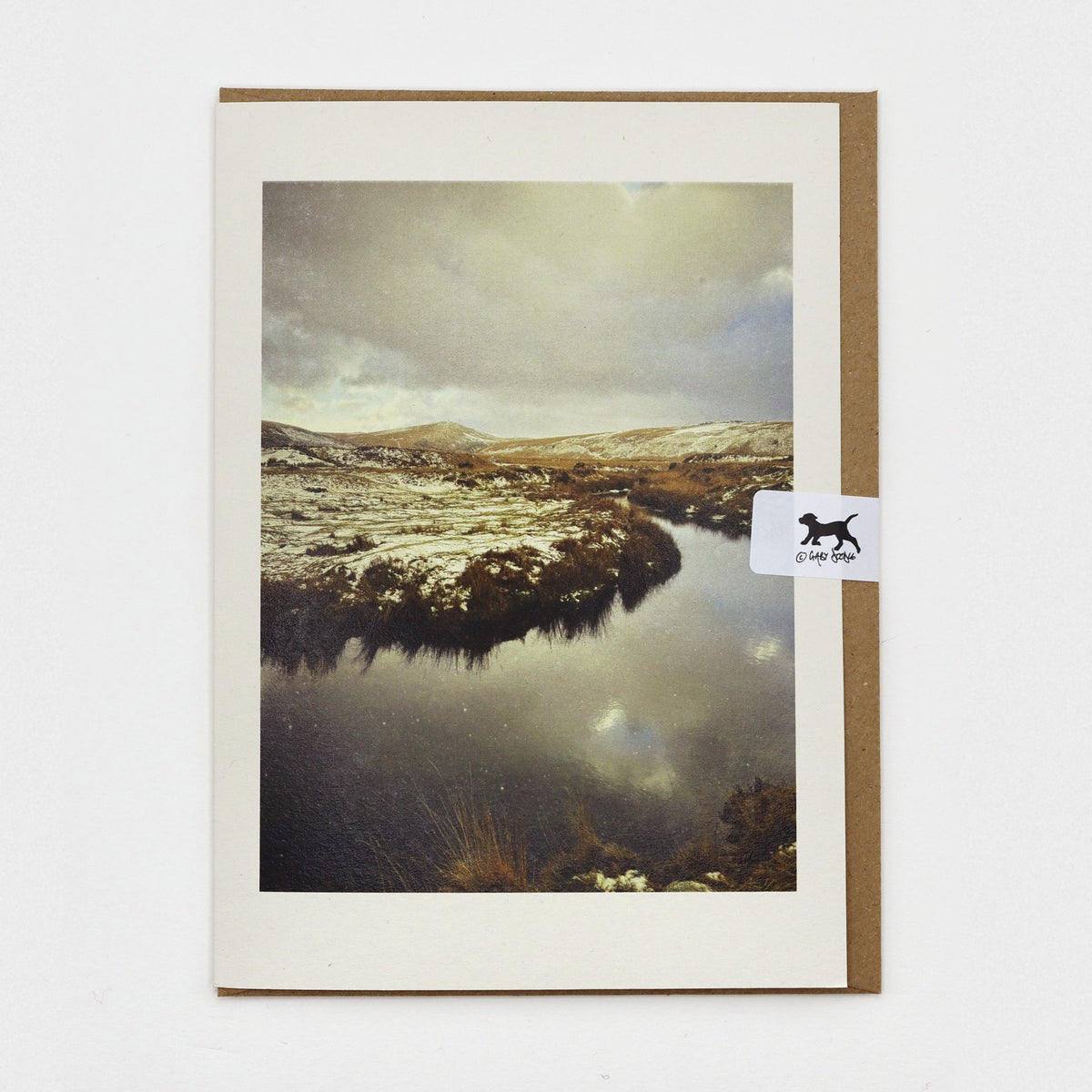 Snow at Taw Marsh Dartmoor Christmas card on a kraft envelope with Gaby Doodle dog seal