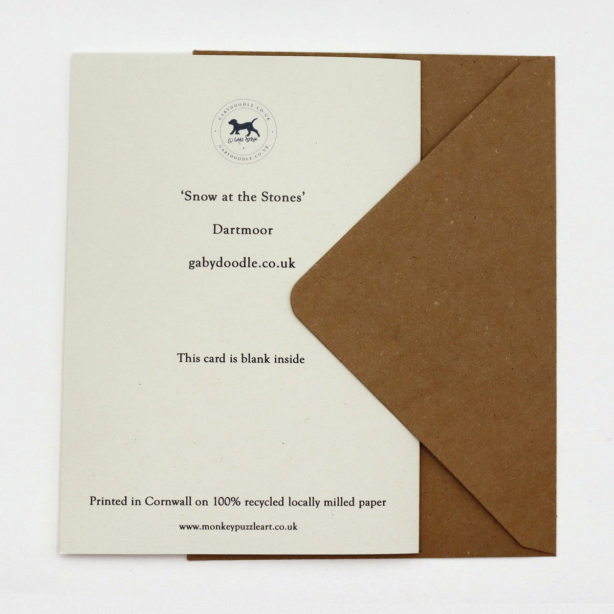 Back of Snow at the Stones Dartmoor Christmas card, blank inside, with Gaby Doodle logo and kraft envelope