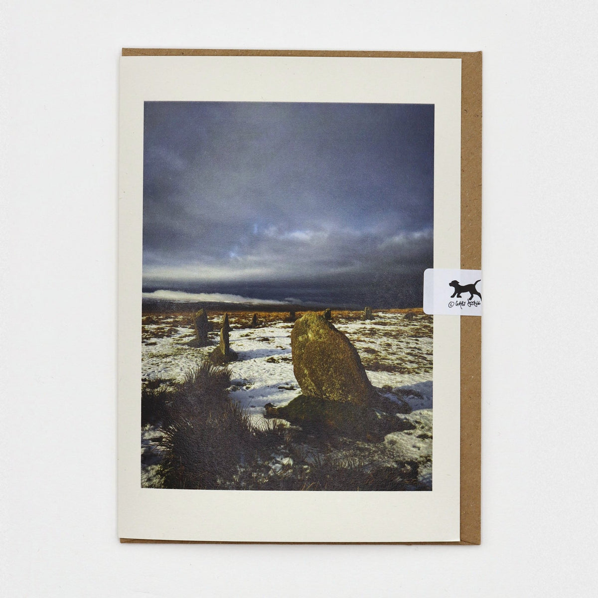 Snow at the Stones Dartmoor Christmas card on a kraft envelope with Gaby Doodle dog seal
