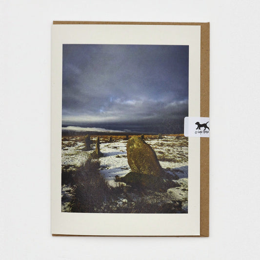 Snow at the Stones Dartmoor Christmas card on a kraft envelope with Gaby Doodle dog seal