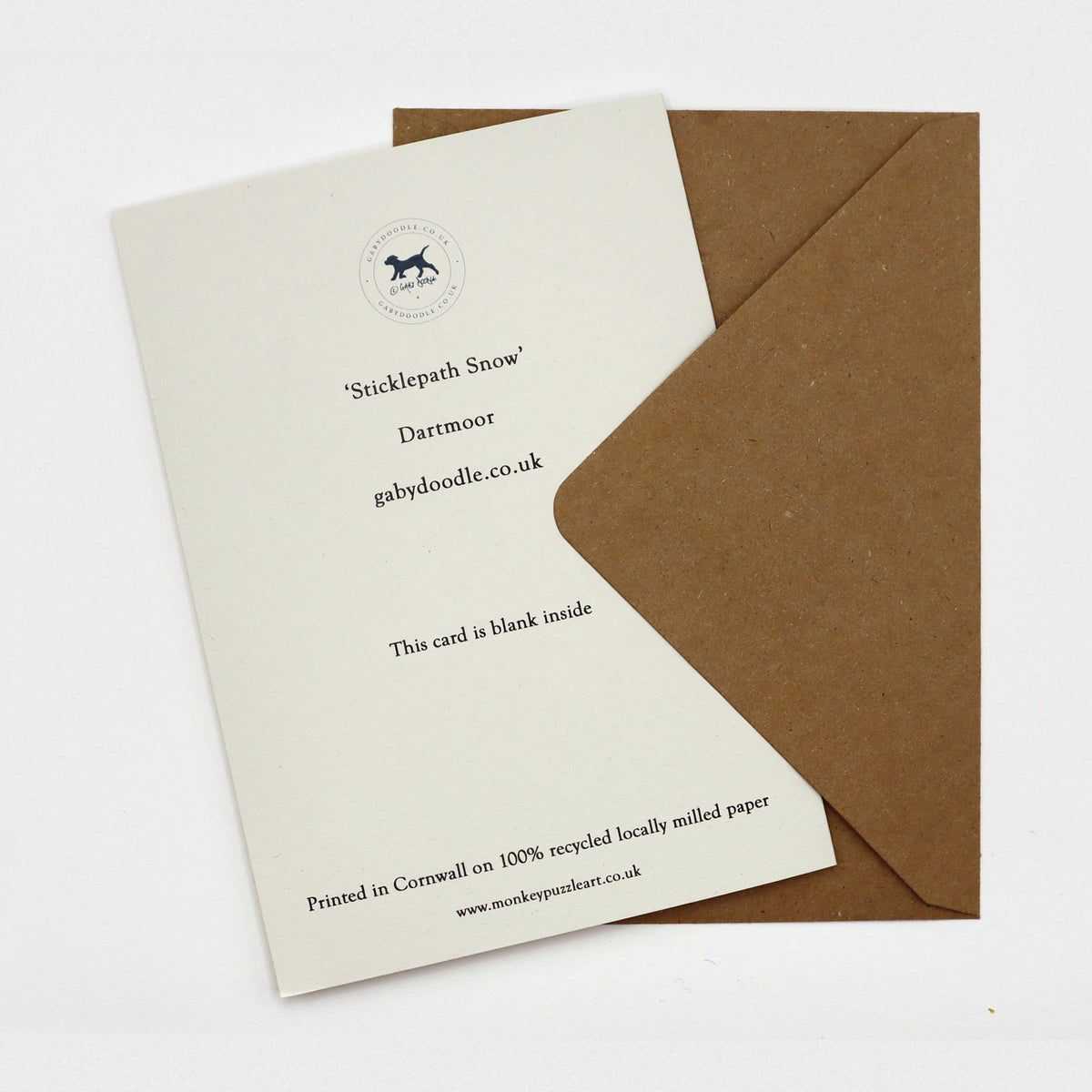Back of Sticklepath Snow Dartmoor Christmas card, blank inside, with Gaby Doodle logo and kraft envelope