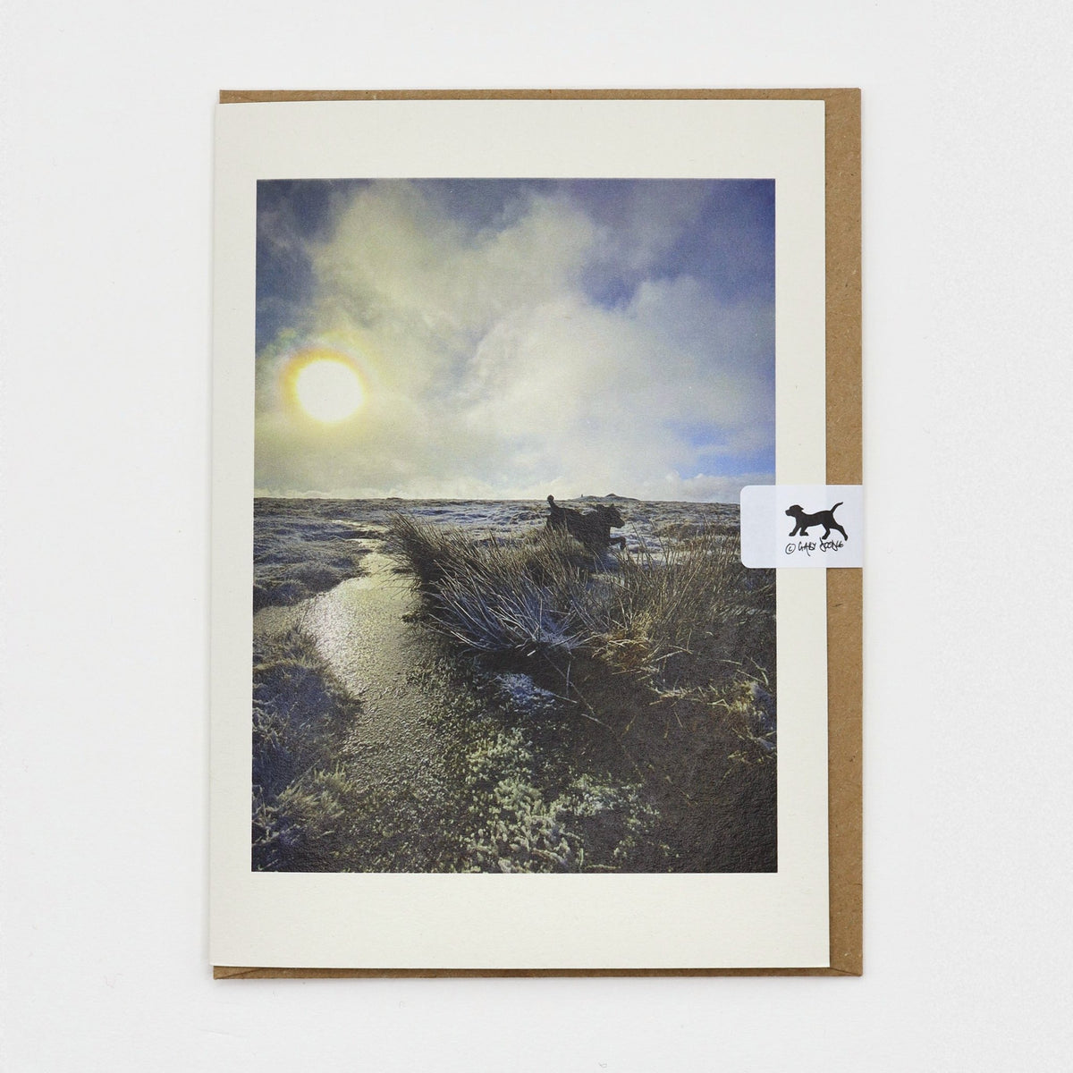 Winter Sun on Cosdon Dartmoor Christmas card on a kraft envelope with Gaby Doodle dog seal